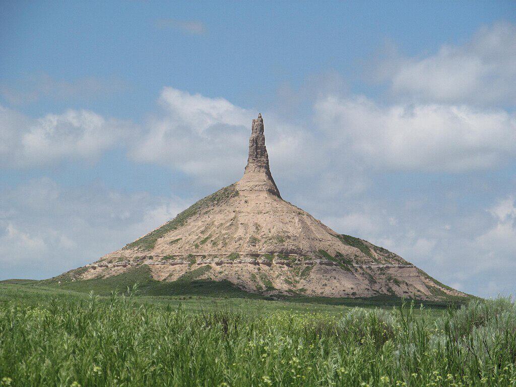 Chimney Rock National Historic Site in Nebraska makes a list of the best coast to coast national parks for a road trip across the nation