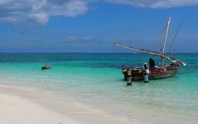 Fisherman fill their boat close to the shore in Zanzibar