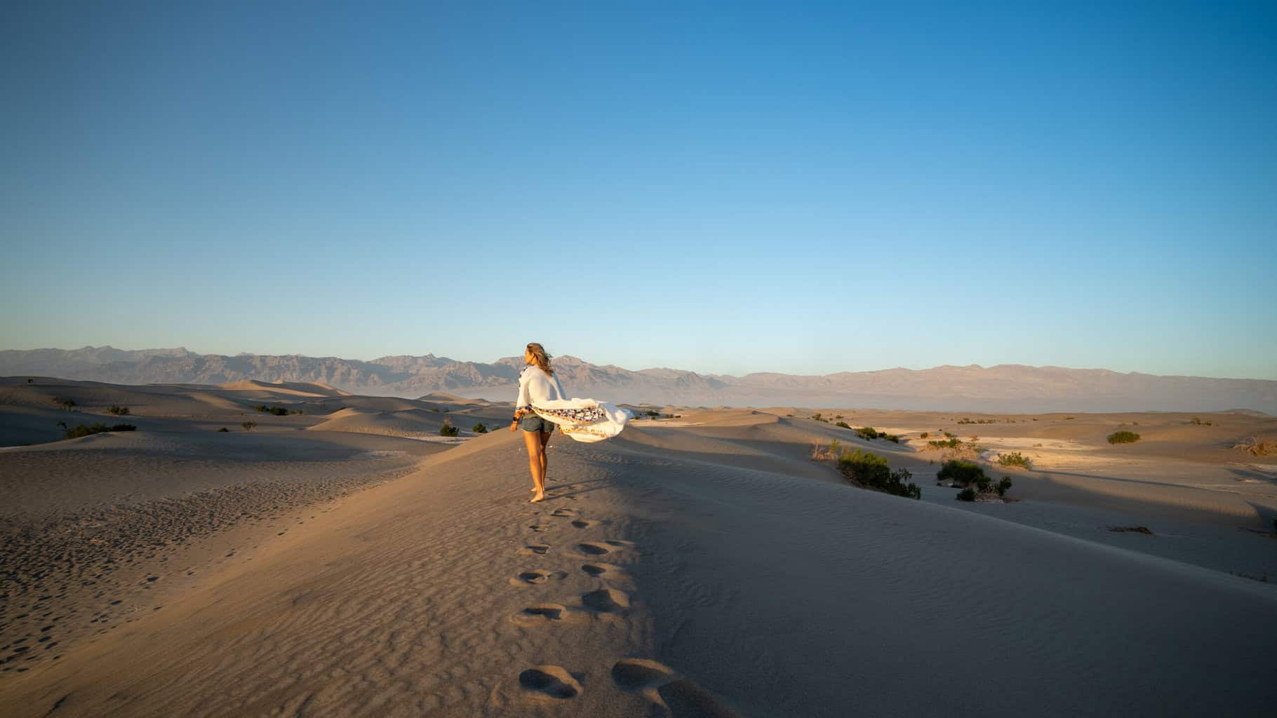 Alice in Death Valley National park  on top of the Mesquite Sand Dunes 