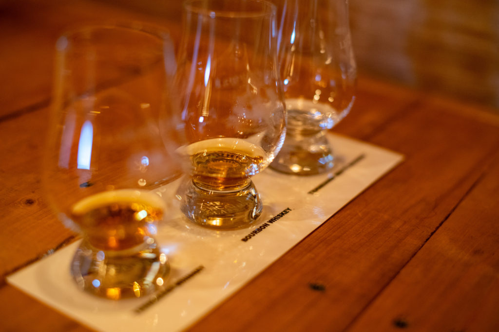 Whiskey glasses with tasting of whiskey