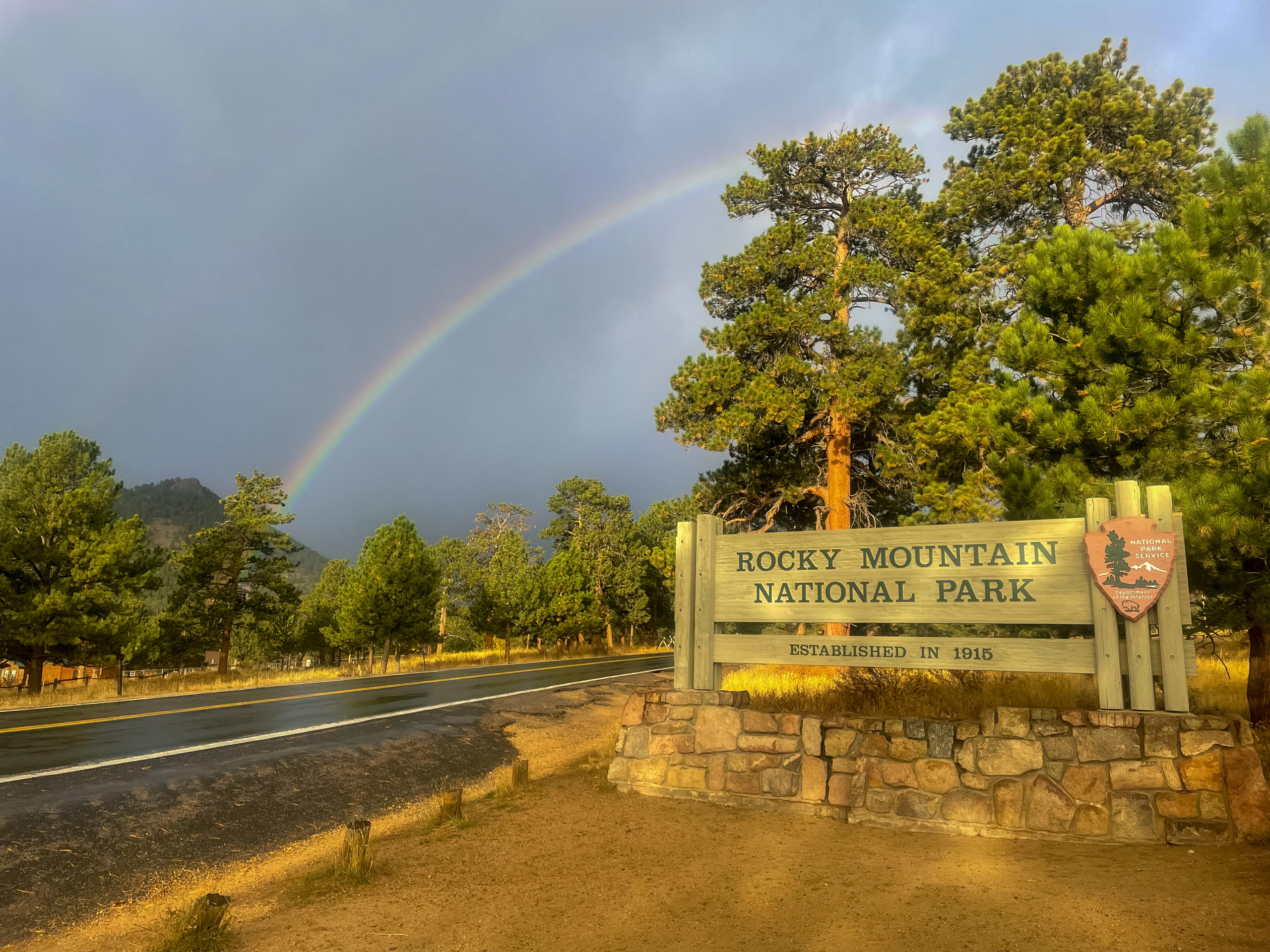 rocky mountain national park with a rainbow 