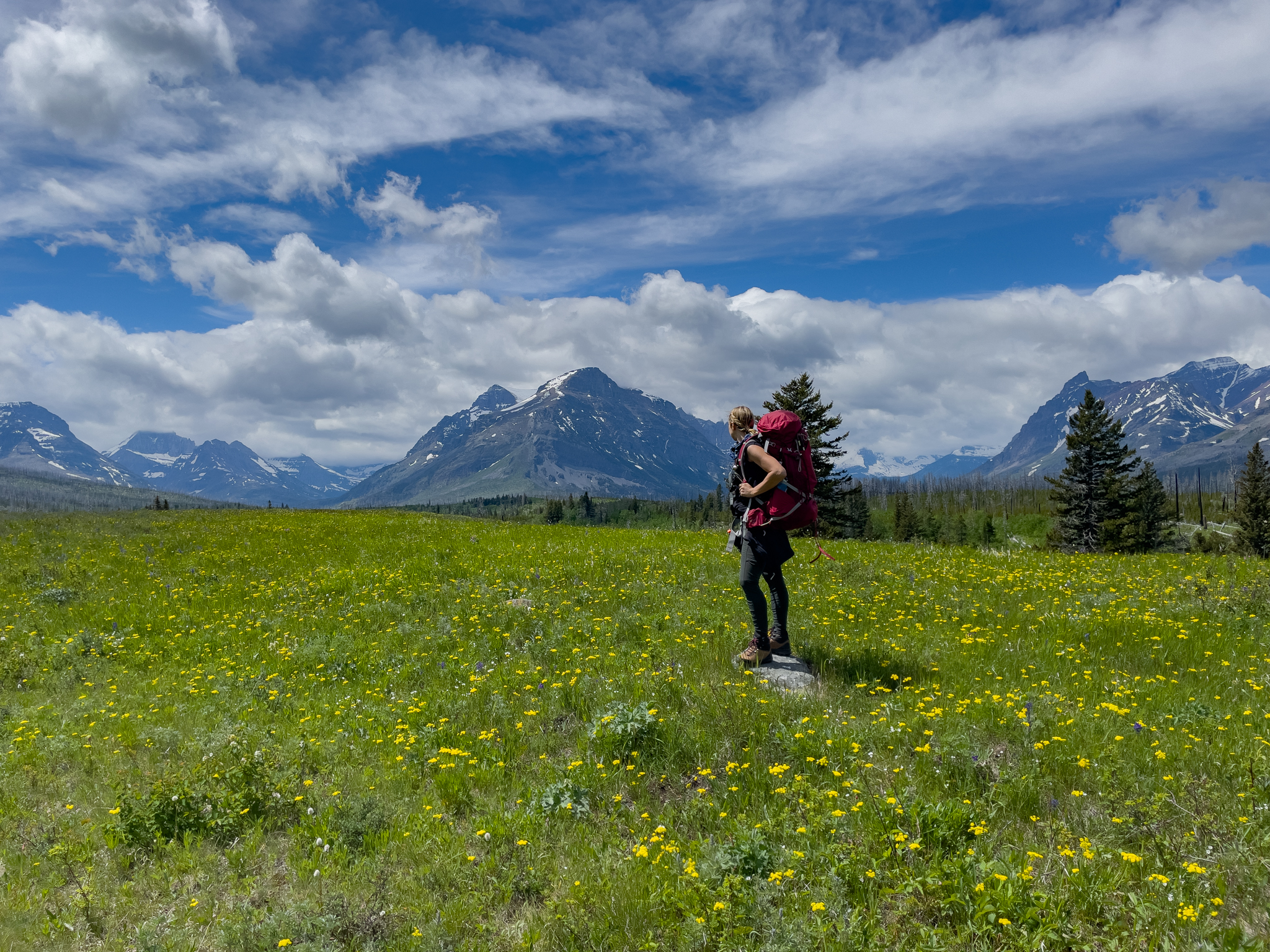 women backpacking in Glacier national park 