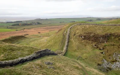 Aerial view of Hadrian's Wall across green rolling hills