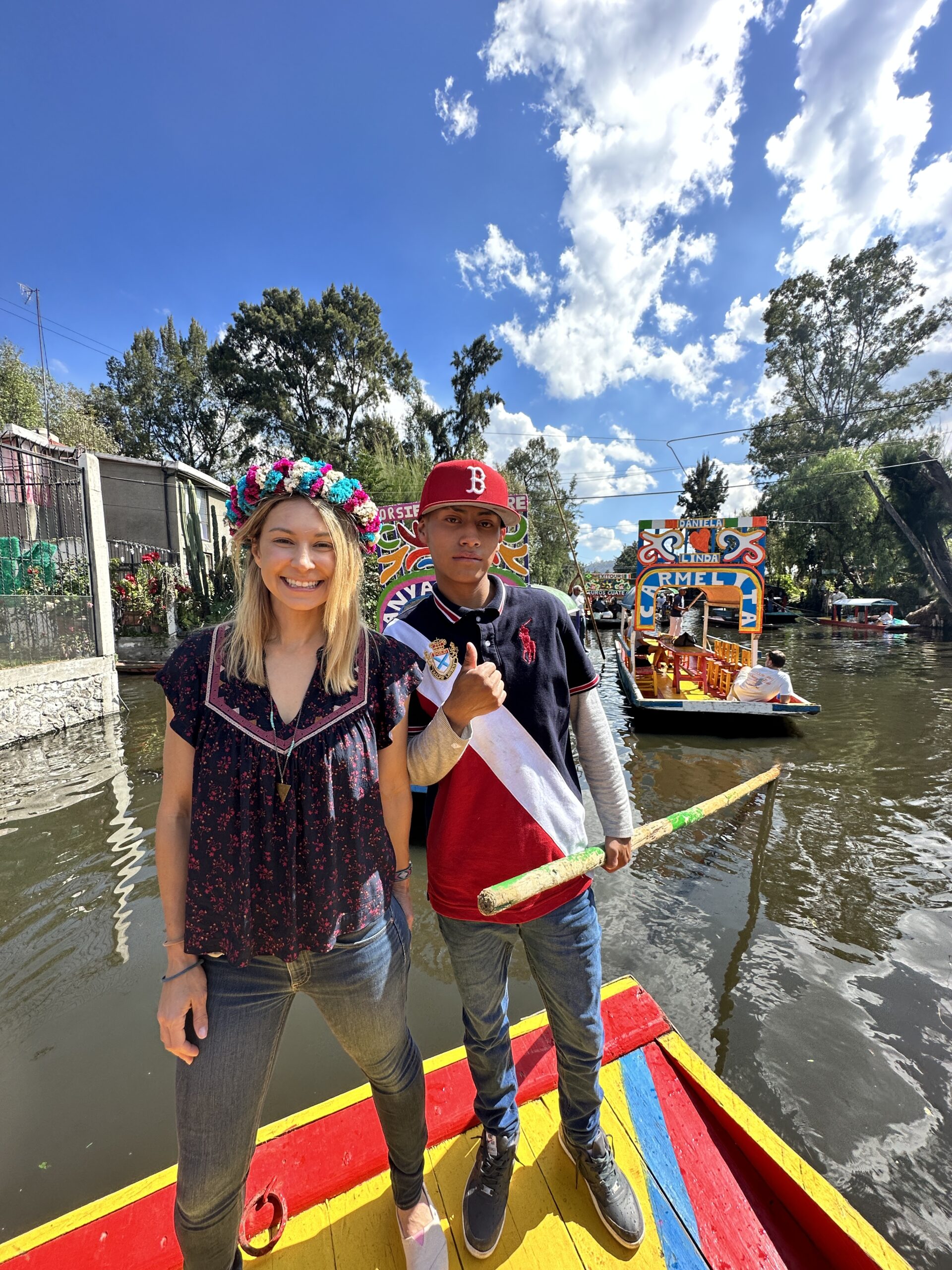 Alice and gondola driver in Xochimilco 