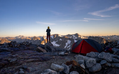 Alice standing at a campsite at Sahale Glacier backcountry camp in the North Cascades