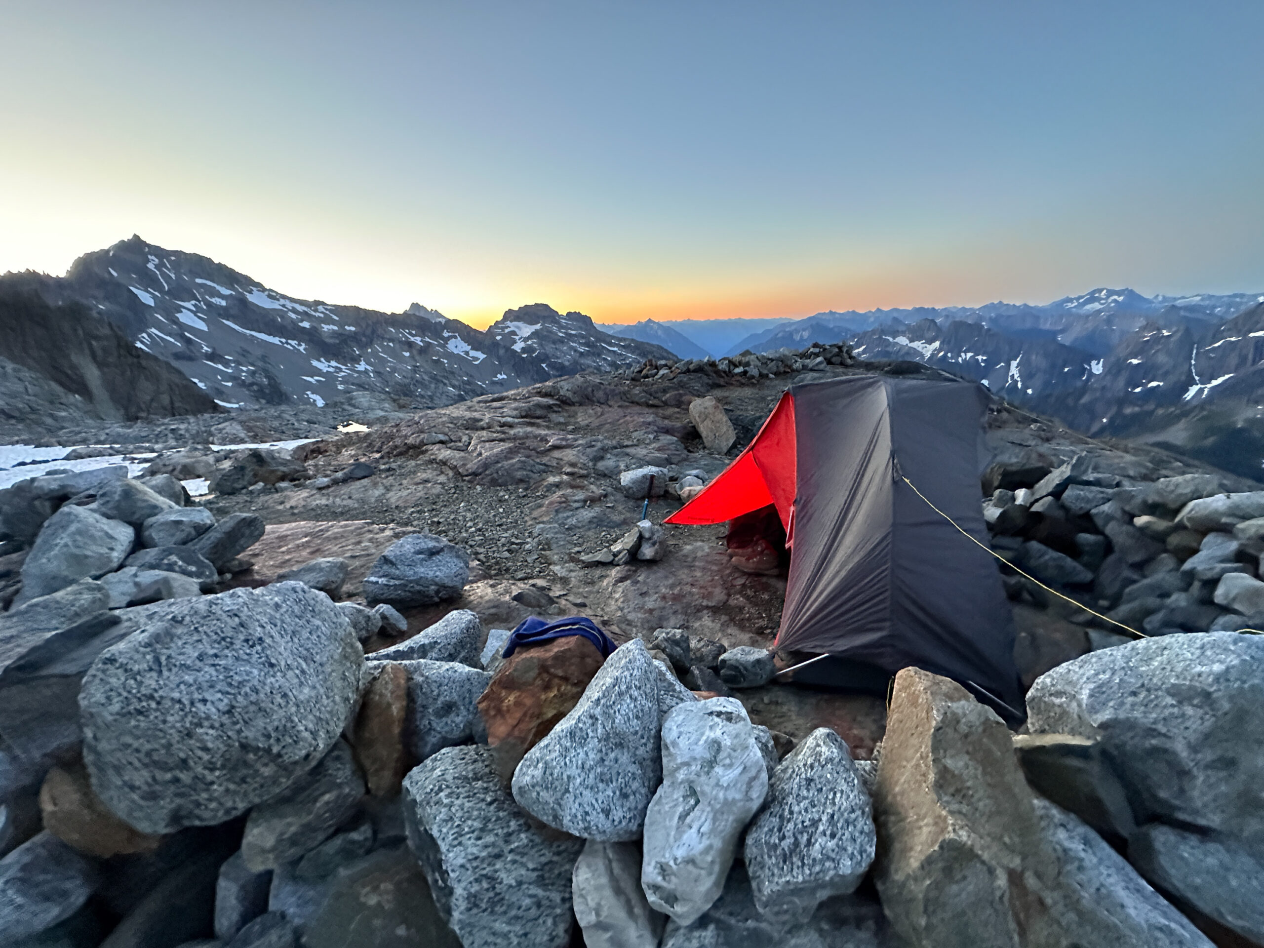 Tent Perched atop a mountain in the Cascades 