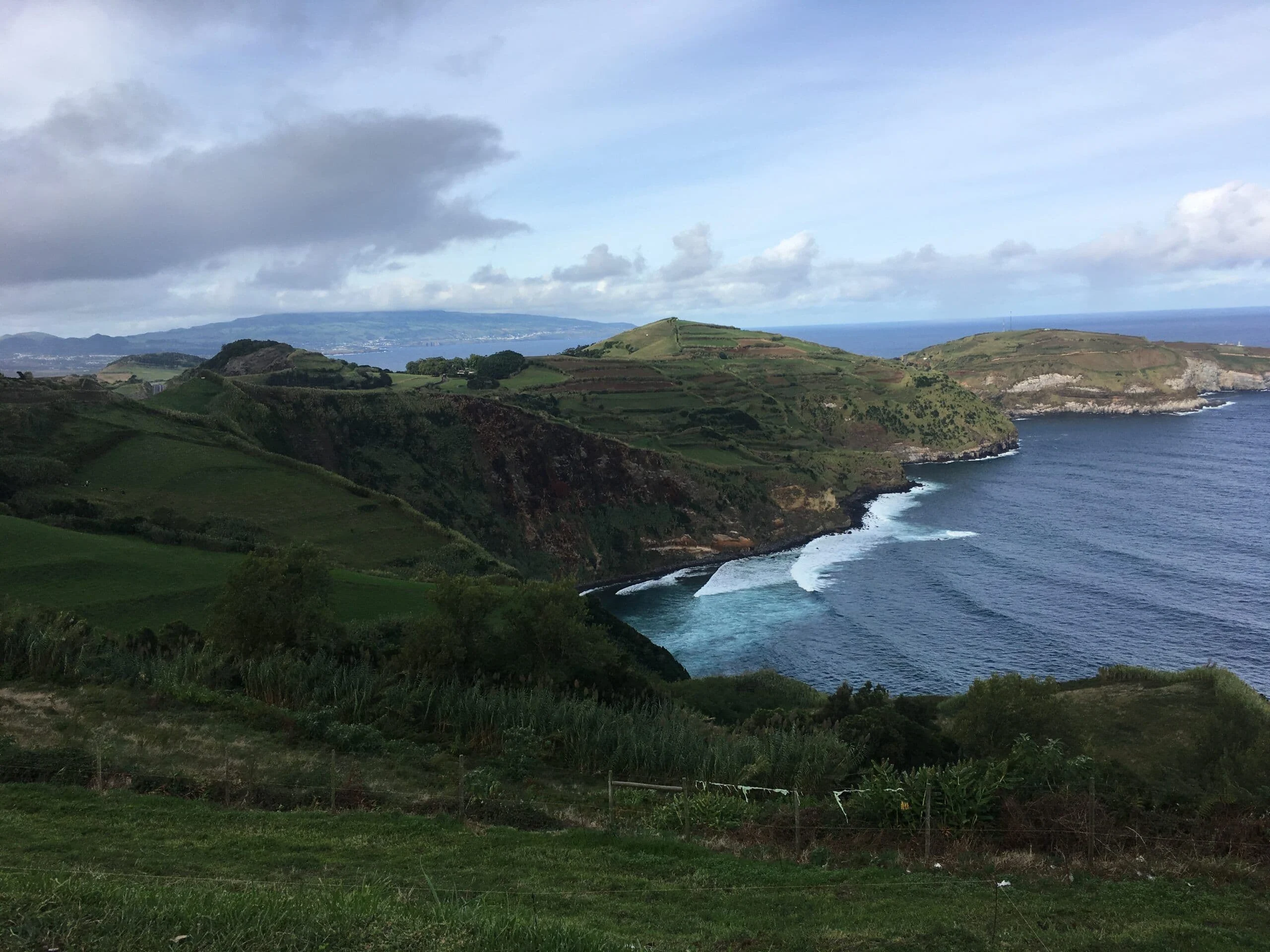 Green Azores headlands meeting the Atlantic
